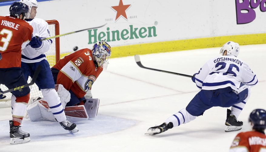 Toronto Maple Leafs right wing Nikita Soshnikov (26) scores against Florida Panthers goalie James Reimer (34) in the second period of an NHL hockey game, Tuesday, March 14, 2017, in Sunrise, Fla. (AP Photo/Alan Diaz)