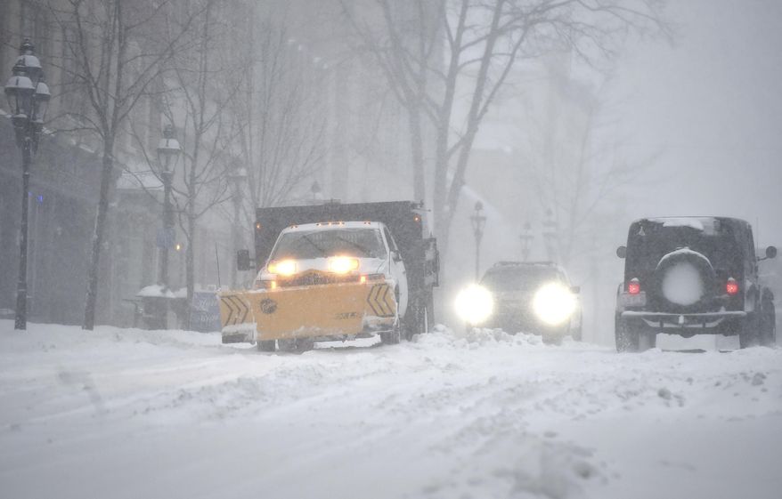 Vehicles travel on Main Street in Bethlehem, Pa., on Tuesday, March 14, 2017, as a Nor'easter hit the Lehigh Valley. The heaviest snow in Pennsylvania fell in a swath from the Gettysburg area near the Maryland line in the south, straight north to New York, and northeast to the Pocono Mountains, the Lehigh Valley and the Scranton and Wilkes-Barre region. (April Bartholomew /The Morning Call via AP)