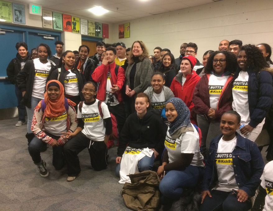 Alexandria, Virginia, Mayor Allison Silberberg with students at T.C. Williams High School after kicking off "Kick Butts Day" — a day of anti-tobacco campaigning sponsored by the Substance Abuse Prevention Coalition of Alexandria. (Julia Brouillette/THE WASHINGTON TIMES)