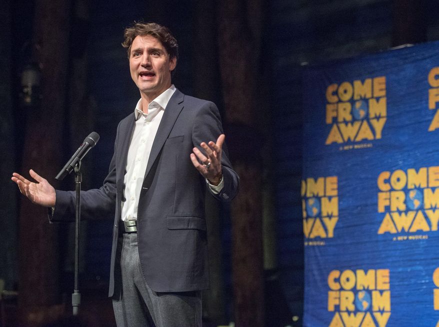 Canadian Prime Minister Justin Trudeau speaks to the audience before the start of the Broadway musical "Come From Away," in New York, on Wednesday, March 15, 2017. (Ryan Remiorz/The Canadian Press via AP)