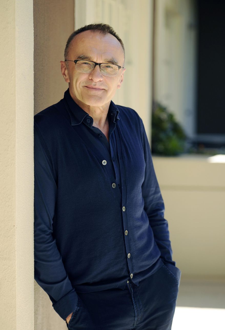 In this March 6, 2017 photo, director Danny Boyle poses for a portrait at the Four Seasons Hotel in Beverly Hills, Calif., to promote his film, "T2: Trainspotting," a sequel to the 1996 film, "Trainspotting." (Photo by Chris Pizzello/Invision/AP)
