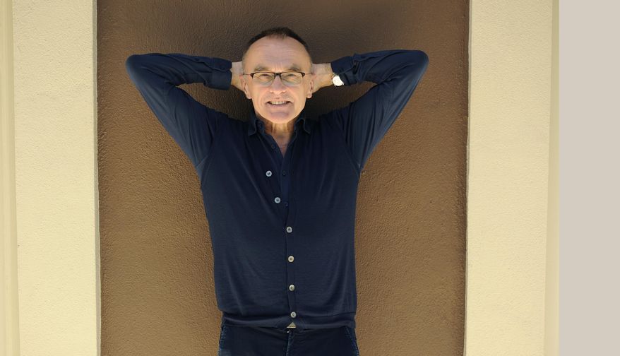 In this March 6, 2017 photo, director Danny Boyle poses for a portrait at the Four Seasons Hotel in Beverly Hills, Calif., to promote his film, "T2: Trainspotting," a sequel to the 1996 film, "Trainspotting." (Photo by Chris Pizzello/Invision/AP)