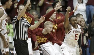 FILE- In this Sunday, March 5, 2017, file photo, Winthrop&#39;s Keon Johnson (5) reacts after making a 3-point basket against Campbell in the second half of the Big South Conference championship NCAA college basketball game against Campbell in Rock Hill, S.C. After leading Winthrop to the Big South Conference Tournament title, Johnson is ready for his big moment in the NCAA spotlight in the first round against Butler. The 5-foot-7 Johnson is Winthrop&#39;s dynamic point guard. (AP Photo/Chuck Burton, File)