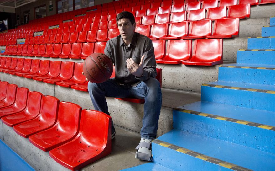 Former Belgian professional basketball player from Brazil, Sebastien Bellin, speaks with the Associated Press at the Aalster Basketball Forum in Aalst, Belgium on Thursday, March 16, 2017. The former basketball player, badly hurt in the suicide bomb attack on Brussels airport a year ago is urging the Belgian government to live up to its pledge to help the victims. (AP Photo/Virginia Mayo)