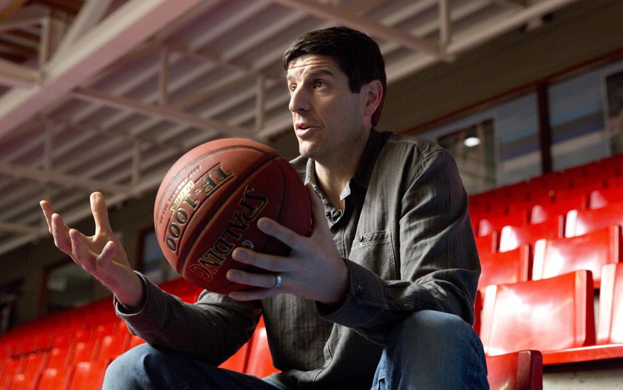 Former Belgian professional basketball player from Brazil, Sebastien Bellin, speaks with the Associated Press at the Aalster Basketball Forum in Aalst, Belgium on Thursday, March 16, 2017. The former basketball player, badly hurt in the suicide bomb attack on Brussels airport a year ago is urging the Belgian government to live up to its pledge to help the victims. (AP Photo/Virginia Mayo)