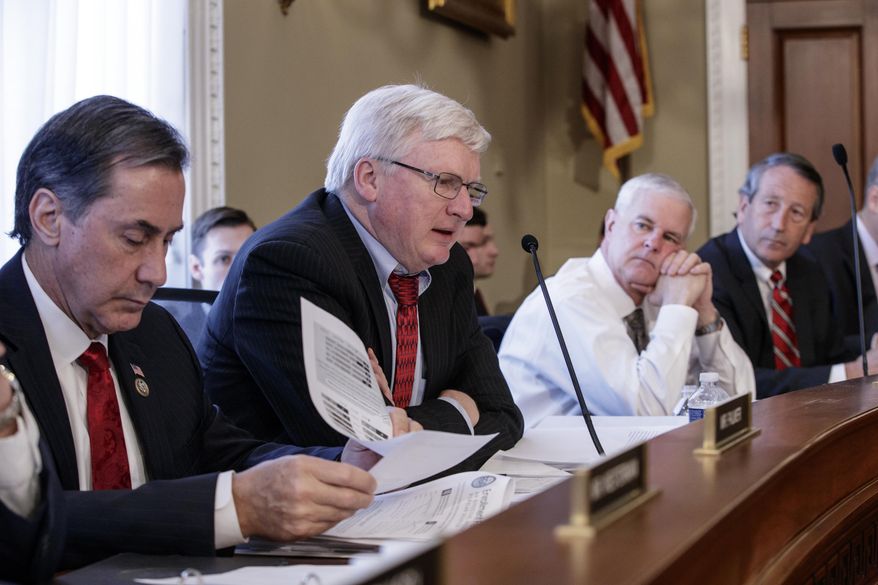 From left, Rep. Gary Palmer, R-Ala., Rep. Glenn Grothman, R-Wis., Rep. Steve Womack, R-Ark., and Rep. Mark Sanford, R-S.C., and the House Budget Committee members work on the Republican health care bill, on Capitol Hill in Washington, Thursday, March, 16, 2017. (AP Photo/J. Scott Applewhite)