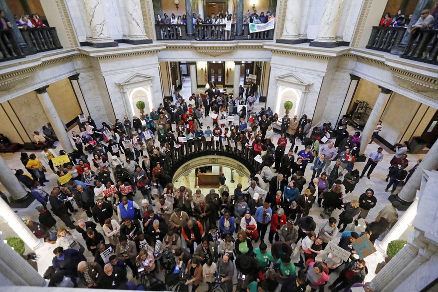 Several hundred parents, educators, education activists, and students join a handful of legislators in an education rally at the Capitol in Jackson, Miss., Thursday, March 16, 2017. Advocates for public schools are opposing legislative leaders' plans to rewrite the state's school funding formula. (AP Photo/Rogelio V. Solis)
