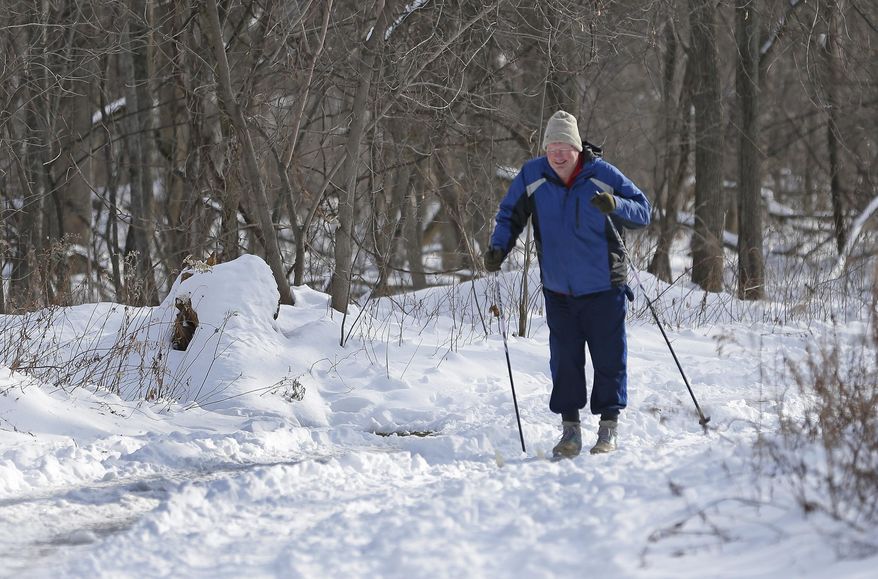 In a Jan. 5, 2016 photo, Charlie Frisk, a member of the Baird Creek Preservation Foundation, cross-country skis in the park. After 20 years, Frisk estimates the foundation has acquired and donated at least 80 acres to the 600-acre greenway that starts around Henry Avenue and fans out to the north and south as it approaches Huron Road and rural areas outside the city limits (Jim Matthews/The Green Bay Press-Gazette via AP)