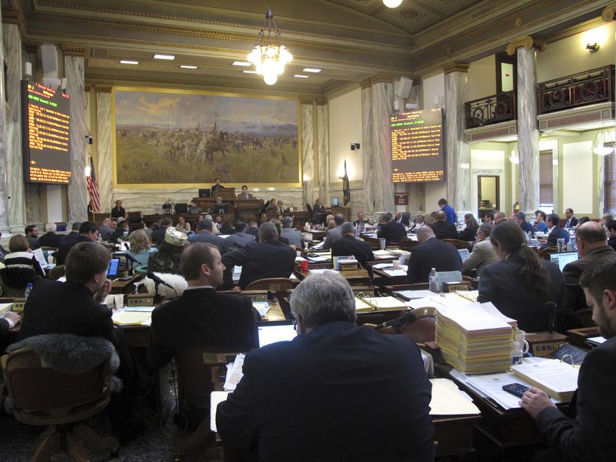 Legislators in the Montana House debate the 2018-2019 state budget Thursday, March 16, 2017, in Helena, Mont. Democrats in the Montana House had one last chance Thursday to try to add money to the state budget for programs in education and health and human services during a floor debate on the two-year spending plan. (AP Photo/Matt Volz)