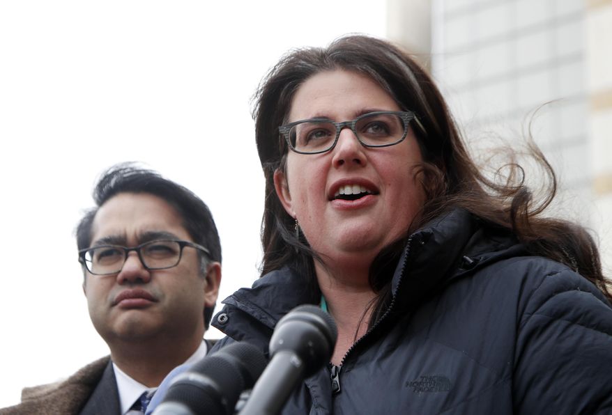 Becca Heller of the International Refugee Assistance Project, right, accompanied by Omar Jadwat of the ACLU speaks to reporters outside court in Greenbelt, Md., Wednesday, March 15, 2017. A federal judge in Maryland says he will issue a ruling in a lawsuit challenging President Donald Trump's revised travel ban. (AP Photo/Manuel Balce Ceneta)