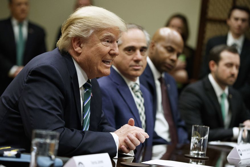 President Donald Trump speaks during a meeting about veterans affairs, Friday, March 17, 2017, in the Roosevelt Room of the White House in Washington. (AP Photo/Evan Vucci)