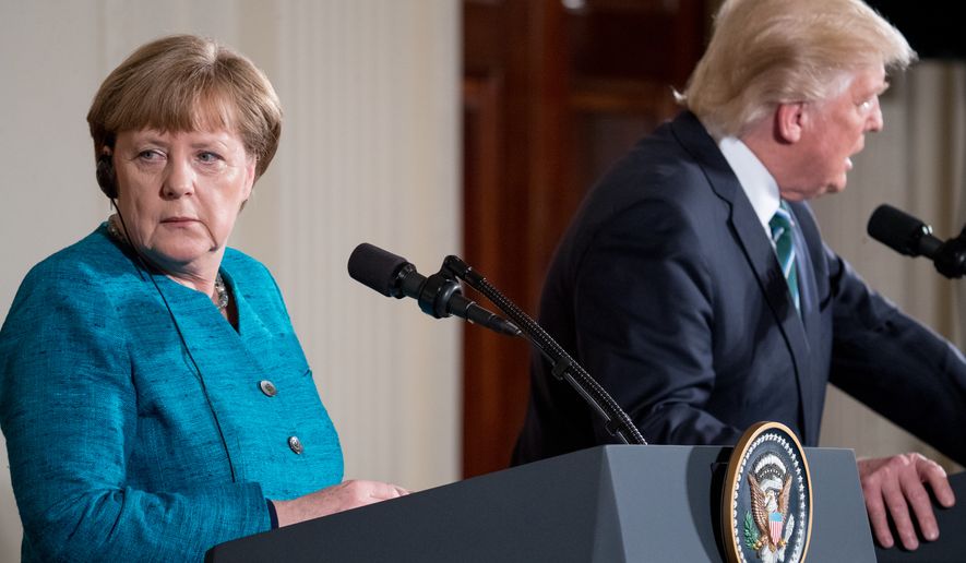 President Donald Trump and German Chancellor Angela Merkel participate in a joint news conference in the East Room of the White House in Washington, Friday, March 17, 2017. (AP Photo/Andrew Harnik)