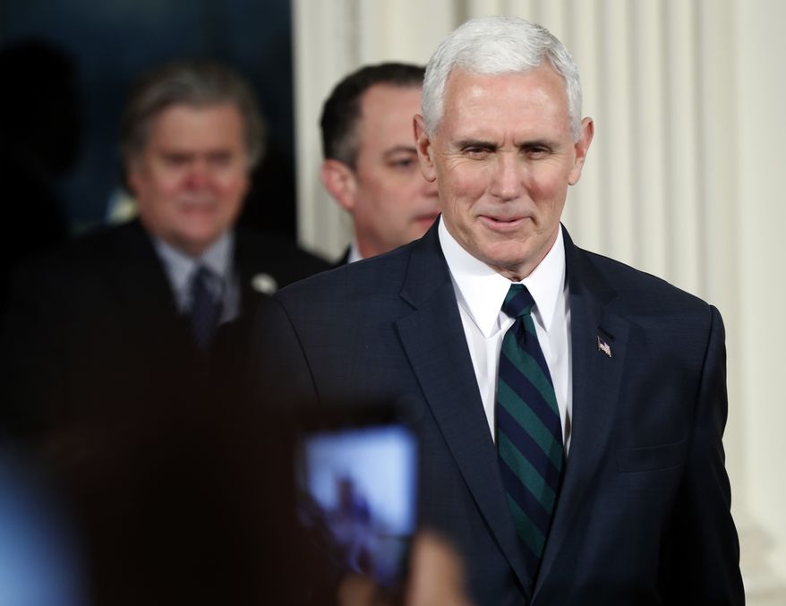 Vice president Mike Pence, right, and Chief of Staff Reince Priebus, center, and White House chief strategist Steve Bannon arrive for news conference with President Donald Trump and German Chancellor Angela Merkel in the East Room of the White House in Washington, Friday, March 17, 2017. (AP Photo/Pablo Martinez Monsivais)