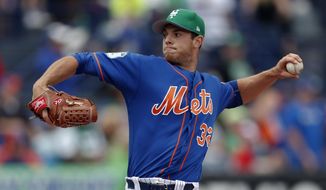 New York Mets starting pitcher Steven Matz works in the first inning of a spring training baseball game against the St. Louis Cardinals Friday, March 17, 2017, in Port St. Lucie, Fla. (AP Photo/John Bazemore)