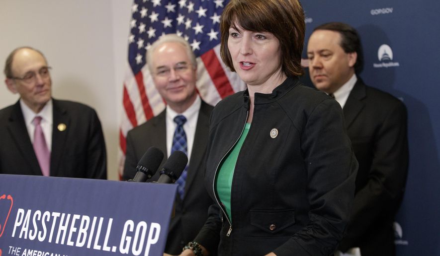 Rep. Cathy McMorris Rodgers, R-Wash., chair of the Republican Conference, center, joined by, from left, Rep. Phil Roe, R-Tenn., Health and Human Services Secretary Tom Price, and Rep. Pat Tiberi, R-Ohio, speaks during a news conference on Capitol Hill in Washington, Friday, March 17, 2017, as House Republicans push for unity in advancing the GOP&#39;s &amp;quot;Obamacare&amp;quot; replacement bill. (AP Photo/J. Scott Applewhite)
