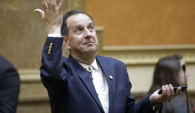 FILE - In this Feb. 23, 2017, file photo, Rep. Norm Thurston, R-Provo, looks on as he stands on he floor of the Utah House of Representatives at the Utah State Capitol, in Salt Lake City. Utah's hospitality industry is urging Gov. Gary Herbert to veto a bill giving Utah the strictest DUI threshold in the country, lowering the blood alcohol limit to .05 percent, down from .08 percent. Thurston, says he doesn't think it will hurt tourism but it would make people think twice about drinking and driving. (AP Photo/Rick Bowmer, File)