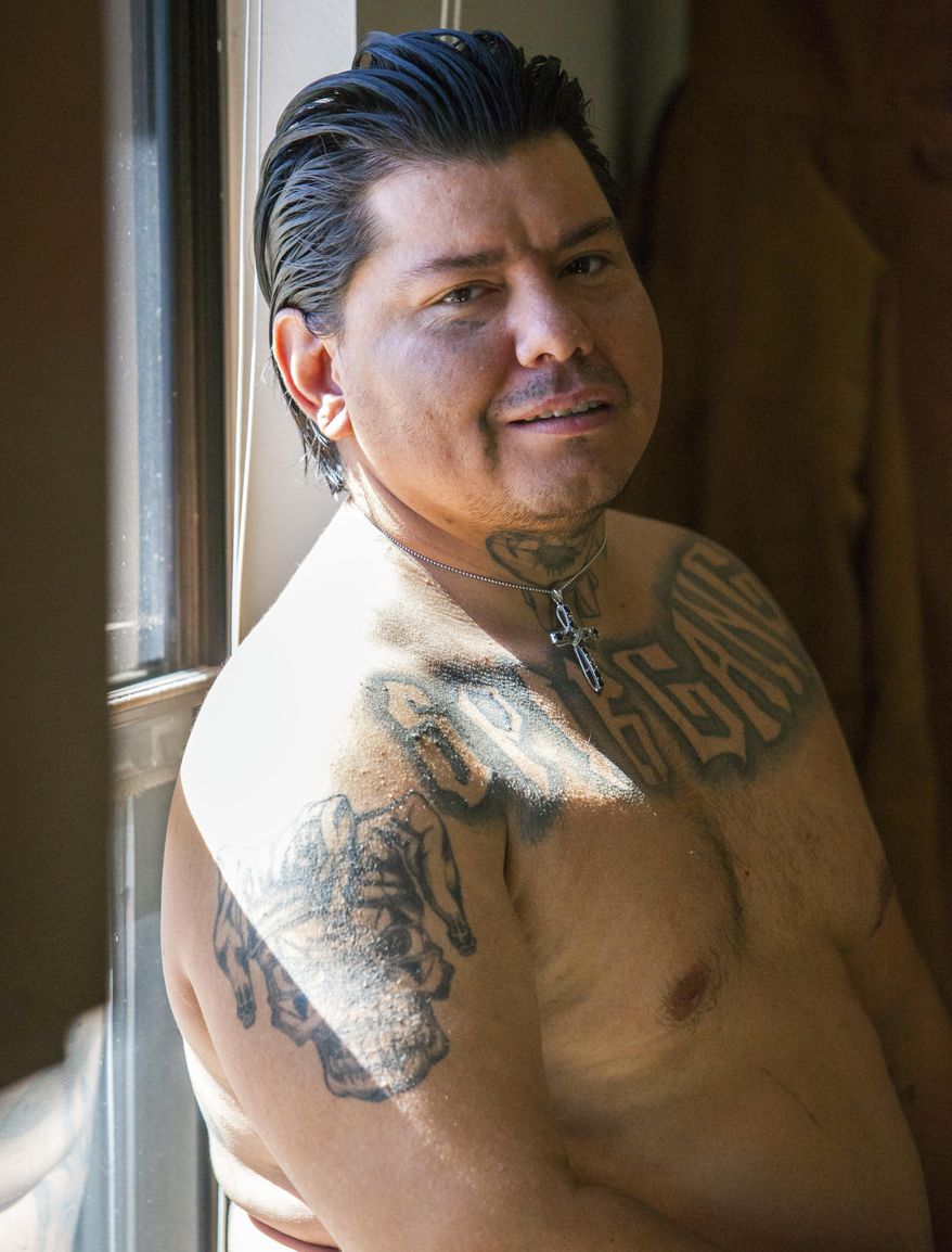 In this March 3, 2017 photo, David Montoya poses for a photo at his home in Cedar City, Utah. Montoya is a former convict who overcame his troubled past to become a current Mental Health Court participant. (Jordan Allred/The Spectrum via AP)