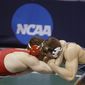 Cornell&#39;s Gabe Dean, left, grapples with Old Dominion&#39;s Jack Deschow in a 184-pound match in the quarterfinal round of the NCAA Division I wresting championships, Friday, March 17, 2017, in St. Louis.(AP Photo/Tom Gannam)