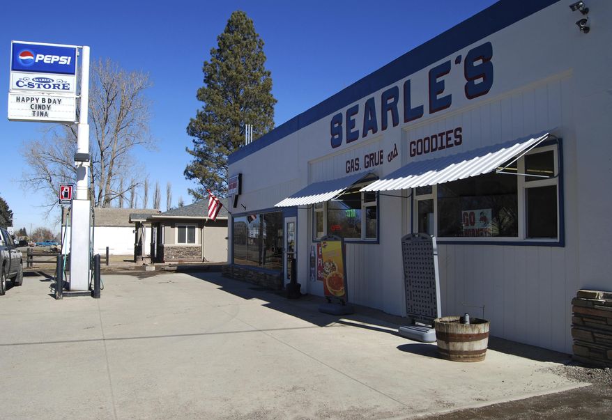 In this 2017 photo, Searle's Gas, Grub and Goodies serves Oakley, Idaho, residents as a gas station, diner, convenience store, party supply/gift store and ATM. Around lunchtime on weekdays, the place is packed with teens and smells heavily of french fries and hamburgers. (Heather Kennison/The Times-News via AP)