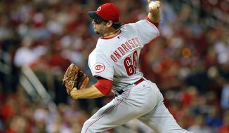 In this Aug. 20, 2014 file photo, Cincinnati Reds relief pitcher Logan Ondrusek throws during the sixth inning of a baseball game against the St. Louis Cardinals, in St. Louis. Ondrusek, due to have his elbow examined next week by Dr. James Andrews, has been released by the Baltimore Orioles. Ondrusek’s locker at Baltimore’s spring training camp was taken over Thursday, March 16, 2017, by pitcher Gabriel Ynoa. (AP Photo/Scott Kane, File)