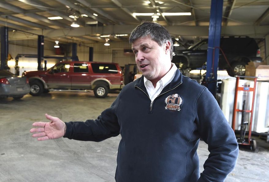 In this March 6, 2017 photo, Gordon Tryan, general manager at Brown's Auto Service in Billings, Mont. talks about training programs for schools. (Larry Mayer /The Billings Gazette via AP)