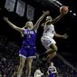 Kansas State&#39;s Karyla Middlebrook (21) gets past Drake&#39;s Brenni Rose (12) to put up a shot during the first half of a first-round game in the NCAA women&#39;s college basketball tournament Saturday, March 18, 2017, in Manhattan, Kan. (AP Photo/Charlie Riedel)