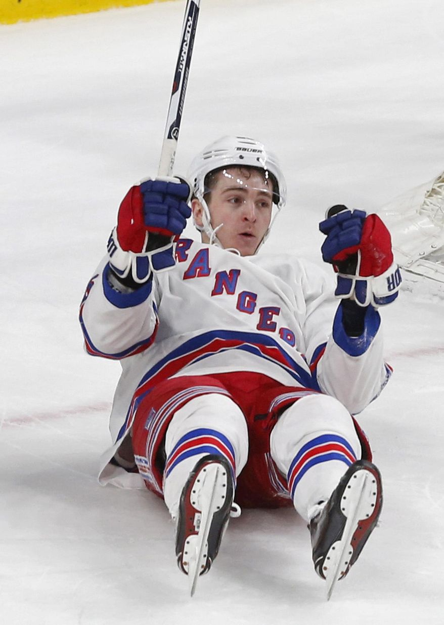 New York Rangers&#39; Jimmy Vesey celebrates his goal against Minnesota Wild goalie Devan Dubnyk during the second period of an NHL hockey game Saturday, March 18, 2017, in St. Paul, Minn. (AP Photo/Jim Mone)