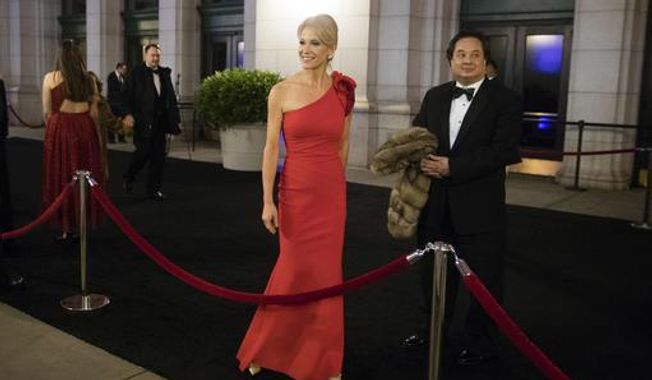 In this Thursday, Jan. 19, 2017 file photo, President-elect Donald Trump adviser Kellyanne Conway, center, accompanied by her husband, George, speaks with members of the media as they arrive for a dinner at Union Station in Washington, the day before Trump&#x27;s inauguration. Trump has chosen George Conway to head the civil division of the Justice Department. The Wall Street Journal reports that he was chosen to head the office that has responsibility for defending the administration&#x27;s proposed travel ban and defending lawsuits filed against the administration. The White House and the Justice Department would not confirm the pick Saturday, March 18, 2017. George Conway declined to comment. (AP Photo/Matt Rourke)