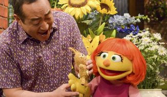 This image released by Sesame Workshop shows Julia, a new autistic muppet character debuting on the 47th Season of &amp;quot;Sesame Street,&amp;quot; on April 10, 2017, on both PBS and HBO. (Zach Hyman/Sesame Workshop via AP)
