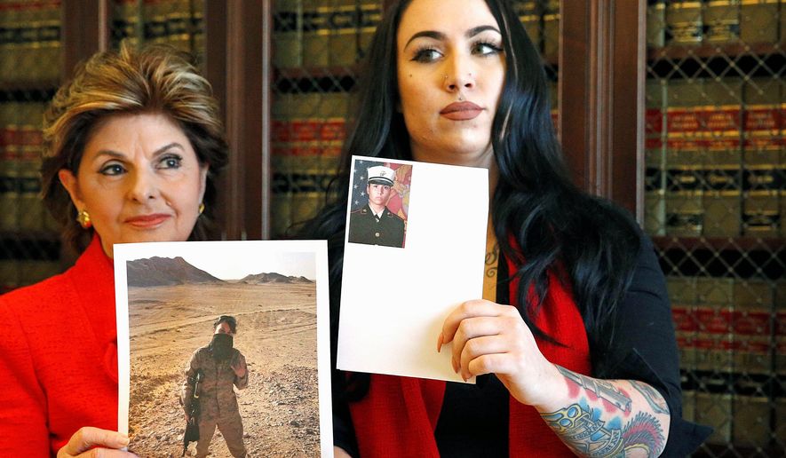 Former Marine Erika Butner, with attorney Gloria Allred, said photographs of her and another active-duty female Marine were posted online without their consent. (Associated Press)
