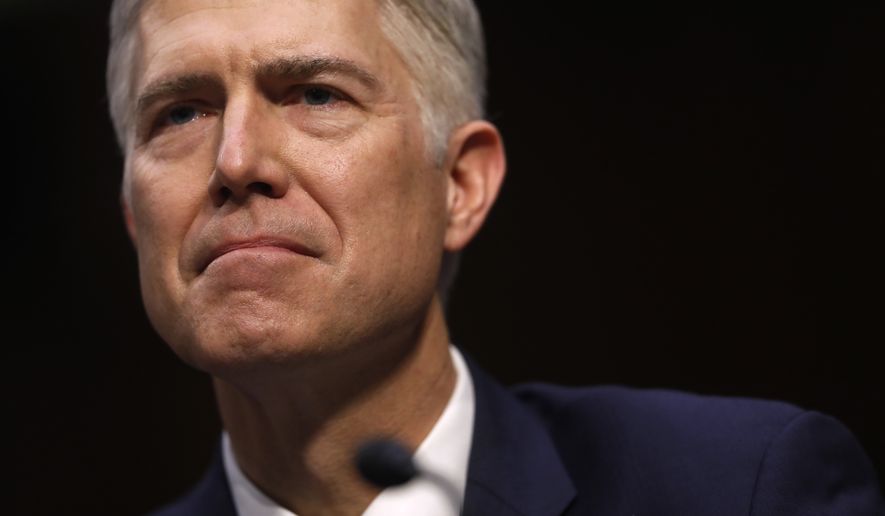Supreme Court Justice nominee Neil Gorsuch arrives on Capitol Hill in Washington, Monday, March 20, 2017, for his confirmation hearing before the Senate Judiciary Committee. (AP Photo/Pablo Martinez Monsivais)