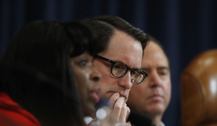 House Intelligence Committee member Rep. Jim Himes, D-Conn., center, and the committee&#39;s ranking member, Rep. Adam Schiff, D-Calif., right, listen as committee member Rep. Terri A. Sewell, D-Ala., left, questions FBI Director James B. Comey and National Security Agency Director Michael Rogers on Capitol Hill in Washington, Monday, March 20, 2017, during the committee&#39;s hearing regarding allegations of Russian interference in the 2016 U.S. presidential election. AP Photo/Manuel Balce Ceneta) ** FILE **