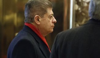 FILE- In this Dec. 15, 2016, file photo, Judge Andrew Napolitano waits for an elevator in the lobby of Trump Tower in New York. Fox News Channel has pulled legal analyst Napolitano from the air after disavowing his on-air claim that British intelligence officials had helped former President Barack Obama spy on Donald Trump.  The move was first reported by The Los Angeles Times on Monday, March 20, 2017. (AP Photo/Evan Vucci, File)