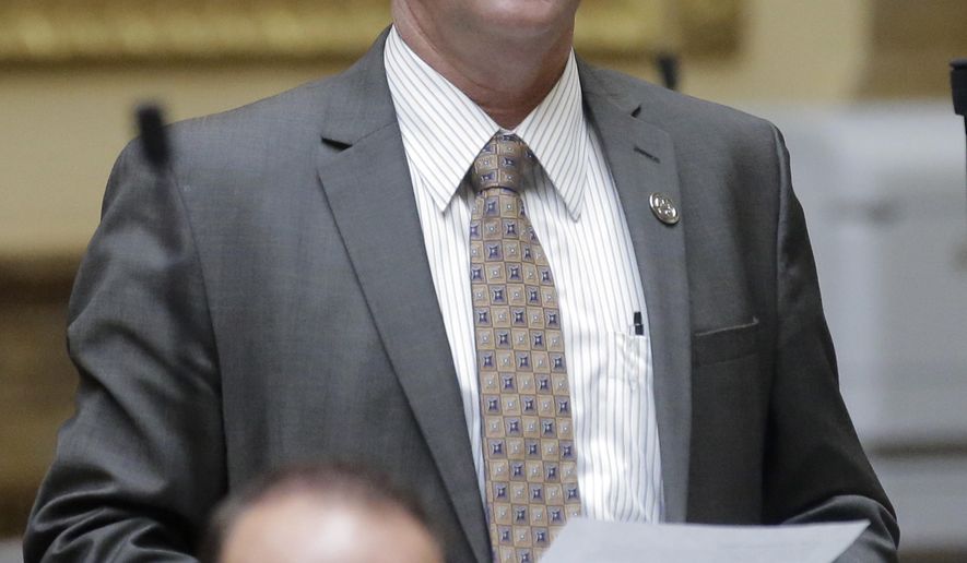 In this photo taken Feb. 22, 2017, Rep. Scott Sandall, R-Tremonton, speaks during the Utah House of Representatives session, at the Utah State Capitol, in Salt Lake City. Gov. Gary Herbert signed 33 bills on Monday, March 20, 2017, including a measure phasing out a tax credit for installing solar panels that legislators said was eating away at money for public schools. A measure from Sandall, exempts small producers of homemade baked goods, jams, jellies and other non-hazardous goods from state food safety inspections. (AP Photo/Rick Bowmer)