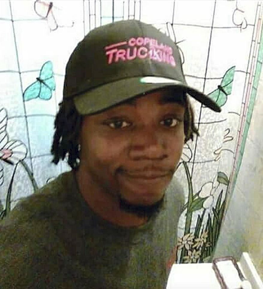 FILE - This undated file photo released by Javille Burns shows her brother, Jamar Clark, who was shot Nov. 15, 2015, after a confrontation with two police officers and died a day later. A federal review Monday, March 20, 2017, of an 18-day standoff outside a Minneapolis police precinct following the fatal shooting of Clark has found problems with the city's coordination and communication. Clark's death sparked weeks of protests that were largely peaceful, though one on Nov. 18 included skirmishes between officers and demonstrators. (Jamar Clark/Javille Burns via AP, File)