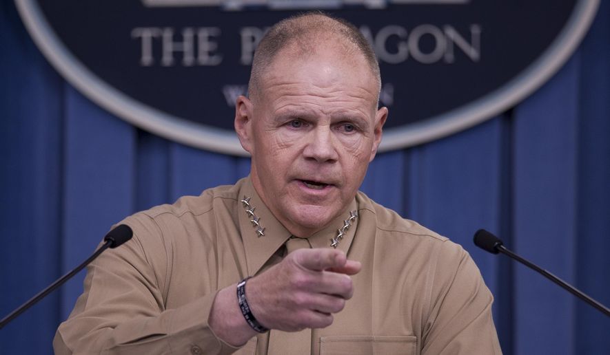 FILE - In this March 10, 2017 file photo, Marine Corps Commandant Gen. Robert Neller speaks during a news conference at the Pentagon. Battered by a nude photo scandal, the Marine Corps has published a longer and more detailed social media policy, laying out the professional and legal ramifications for service members who participate in online misconduct. (AP Photo/Cliff Owen, File)