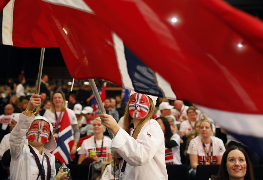 Norwegian supporters wave their flags to support their Chef Christopher William Davidsen during the "Bocuse d'Or" (Golden Bocuse) trophy, in Lyon, central France, Jan. 25, 2017. (AP Photo/Laurent Cipriani) ** FILE **