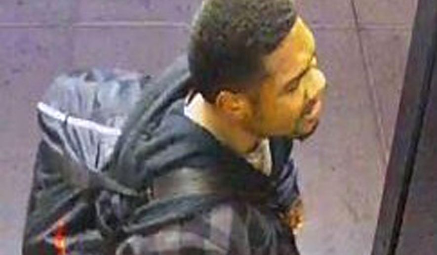 This undated image taken from video and provided by the Las Vegas Metropolitan Police Department shows a man sought in a Jan. 15, 2017, fight during which another man had a piece of his thumb bitten off. Officer Michael Rodriguez said Monday, March 20, 2017, the photo shows the unidentified man boarding a bus in the Las Vegas area. He is believed to be in his late 20s, about 5-foot-7 and 170 pounds. (Las Vegas Metropolitan Police Department via AP)