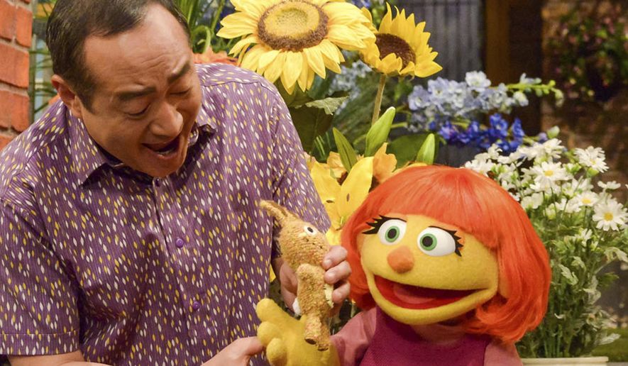 This image released by Sesame Workshop shows Julia, a new autistic muppet character debuting on the 47th Season of &quot;Sesame Street&quot; on April 10, 2017, on both PBS and HBO. (Zach Hyman/Sesame Workshop via AP) ** FILE **