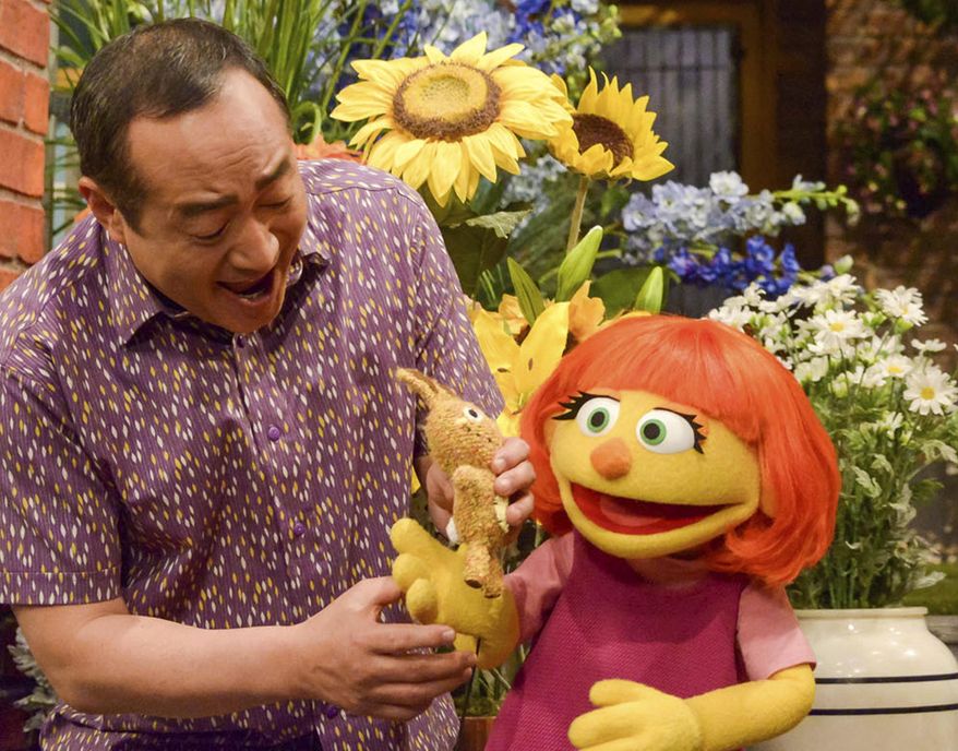 This image released by Sesame Workshop shows Julia, a new autistic muppet character debuting on the 47th Season of &quot;Sesame Street&quot; on April 10, 2017, on both PBS and HBO. (Zach Hyman/Sesame Workshop via AP) ** FILE **