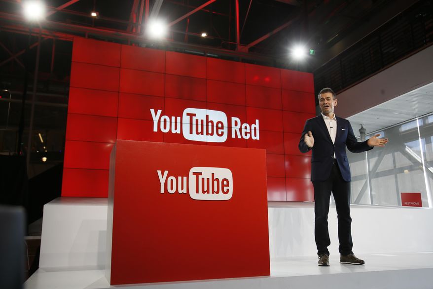 FILE - In this Oct. 21, 2015, file photo, Robert Kyncl, YouTube Chief Business Officer, speaks as YouTube unveils "YouTube Red," a new subscription service, at YouTube Space LA offices in Los Angeles. YouTube explained why some gay-themed content was restricted for certain users in a tweet on March 19, 2017. (AP Photo/Danny Moloshok, File)