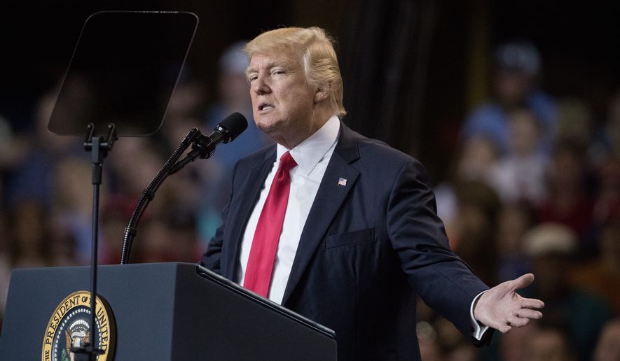 At a rally in Kentucky on Monday night, President Trump promised that he is fully committed to cutting the federal government&#39;s size and influence.&quot;We are going to take power back from the political class in Washington and return that power to you,&quot; he said. (Associated Press)