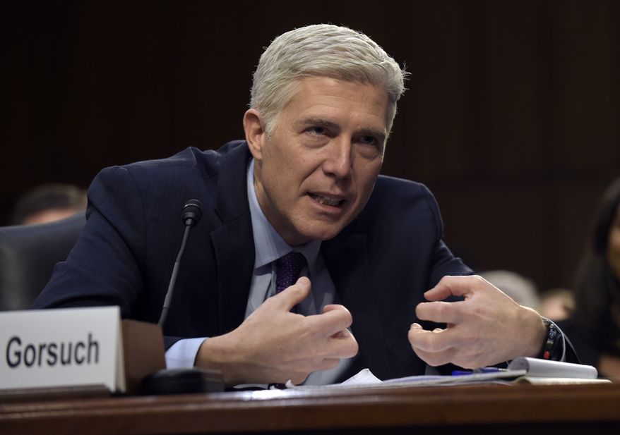 Supreme Court Justice nominee Neil Gorsuch testifies on Capitol Hill in Washington on Tuesday during his confirmation hearing before the Senate Judiciary Committee. His rulings on the Chevron case have drawn criticism from the Senate. (AP Photo/Susan Walsh)