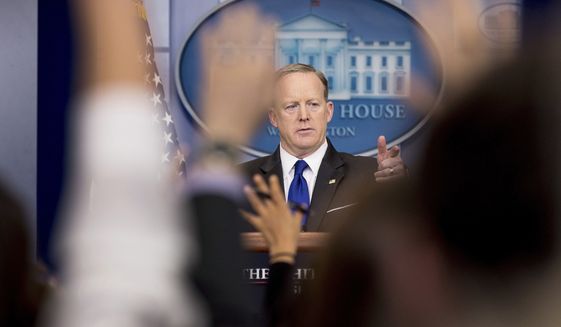 White House press secretary Sean Spicer takes a question from a member of the media during the daily press briefing at the White House in Washington, Tuesday, March 21, 2017. Spicer discussed healthcare, immigration, and other topics. (AP Photo/Andrew Harnik)