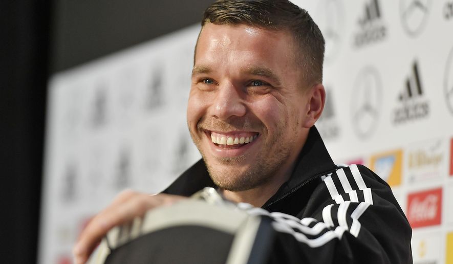 Germany&#39;s forward Lukas Podolski smiles during  a press conference prior the friendly soccer match between Germany and England in Dortmund, Germany, Tuesday, March 21, 2017. Podolski will play his last match for the national team against England on Wednesday. (AP Photo/Martin Meissner)
