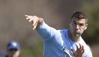 Quarterback Mitch Trubisky passes during North Carolina&#39;s pro timing football day in Chapel Hill, N.C., Tuesday, March 21, 2017. (AP Photo/Gerry Broome)