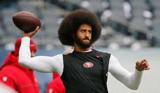 FILE - In this Dec. 4, 2016, file photo, San Francisco 49ers quarterback Colin Kaepernick warms up before an NFL football game against the Chicago Bears. Spike Lee said on Instagram Sunday, March 19, 2017, that it was &quot;fishy&quot; that Kaepernick, now a free agent, hadn&#x27;t been signed.&quot; (AP Photo/Charles Rex Arbogast, File) **FILE**