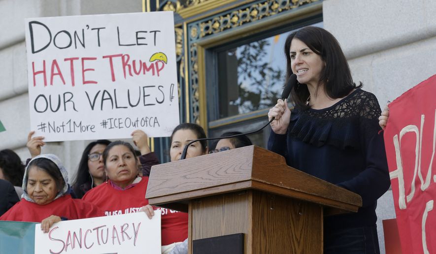 Supervisor Hillary Ronen speaks at a rally outside of City Hall in San Francisco, Wednesday, Jan. 25, 2017. President Donald Trump moved aggressively to tighten the nation&#39;s immigration controls Wednesday, signing executive actions to jumpstart construction of his promised U.S.-Mexico border wall and cut federal grants for immigrant-protecting &quot;sanctuary cities.&quot; (AP Photo/Jeff Chiu)