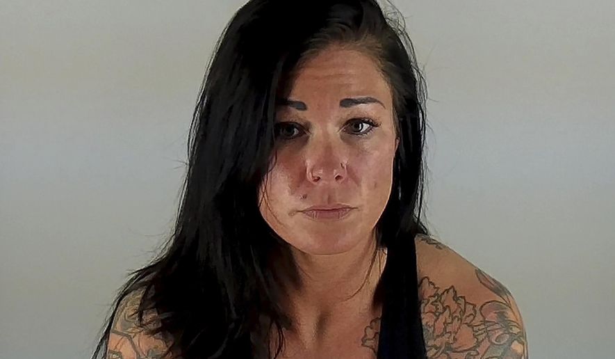 This undated photo provided by the Deschutes County Sheriff's office shows January Neatherlin. A Deschutes County grand jury returned an indictment in Bend, Ore., Tuesday, March 21, 2017, charging Neatherlin with more than 100 criminal charges related to a babysitting business she operated in Bend. Neatherlin is alleged to have, on numerous occasions, left the 2-7 kids in her care, who ranged in ages from 6 months to 4 years old, alone in her house when she went to the gym and tanning salon. (Deschutes County Sheriff's Office via AP)