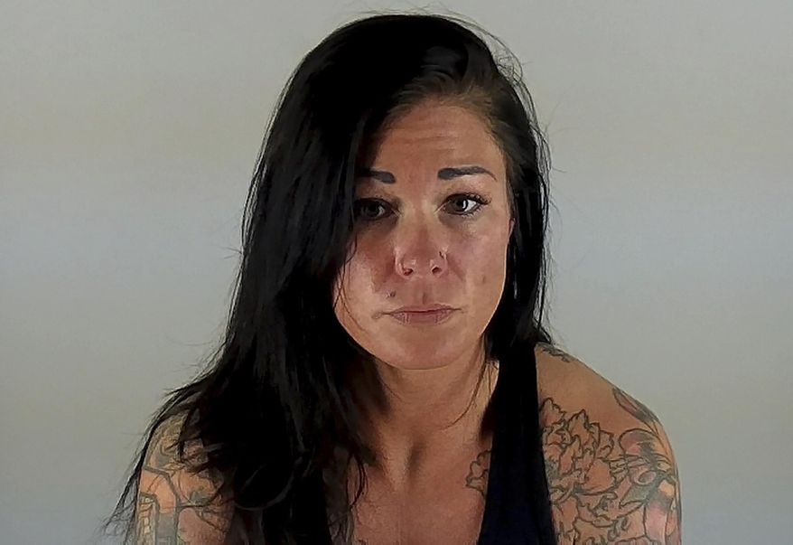 This undated photo provided by the Deschutes County Sheriff's office shows January Neatherlin. A Deschutes County grand jury returned an indictment in Bend, Ore., Tuesday, March 21, 2017, charging Neatherlin with more than 100 criminal charges related to a babysitting business she operated in Bend. Neatherlin is alleged to have, on numerous occasions, left the 2-7 kids in her care, who ranged in ages from 6 months to 4 years old, alone in her house when she went to the gym and tanning salon. (Deschutes County Sheriff's Office via AP)